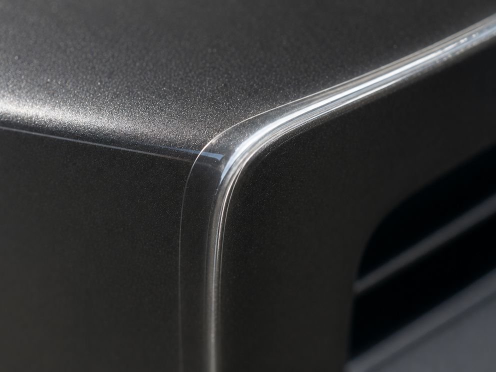 Film stretched around a tight bumper radius without thinning
